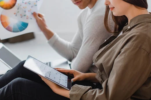 Designer reviewing project on a tablet