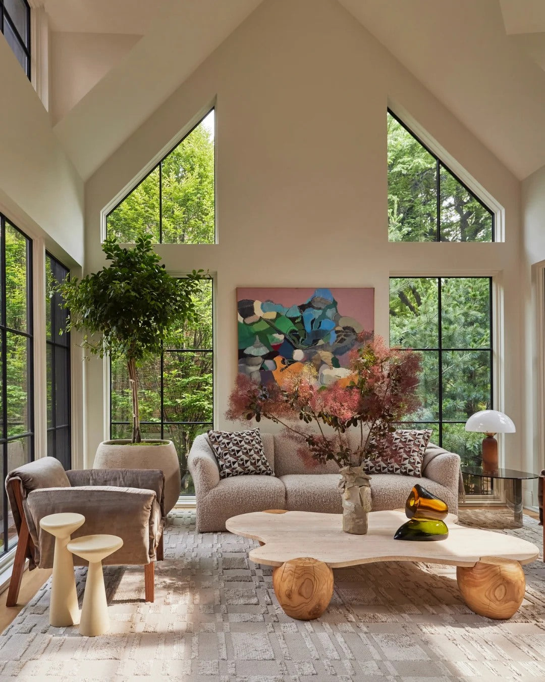 A tall window wall gives the room immediate calm and scale.