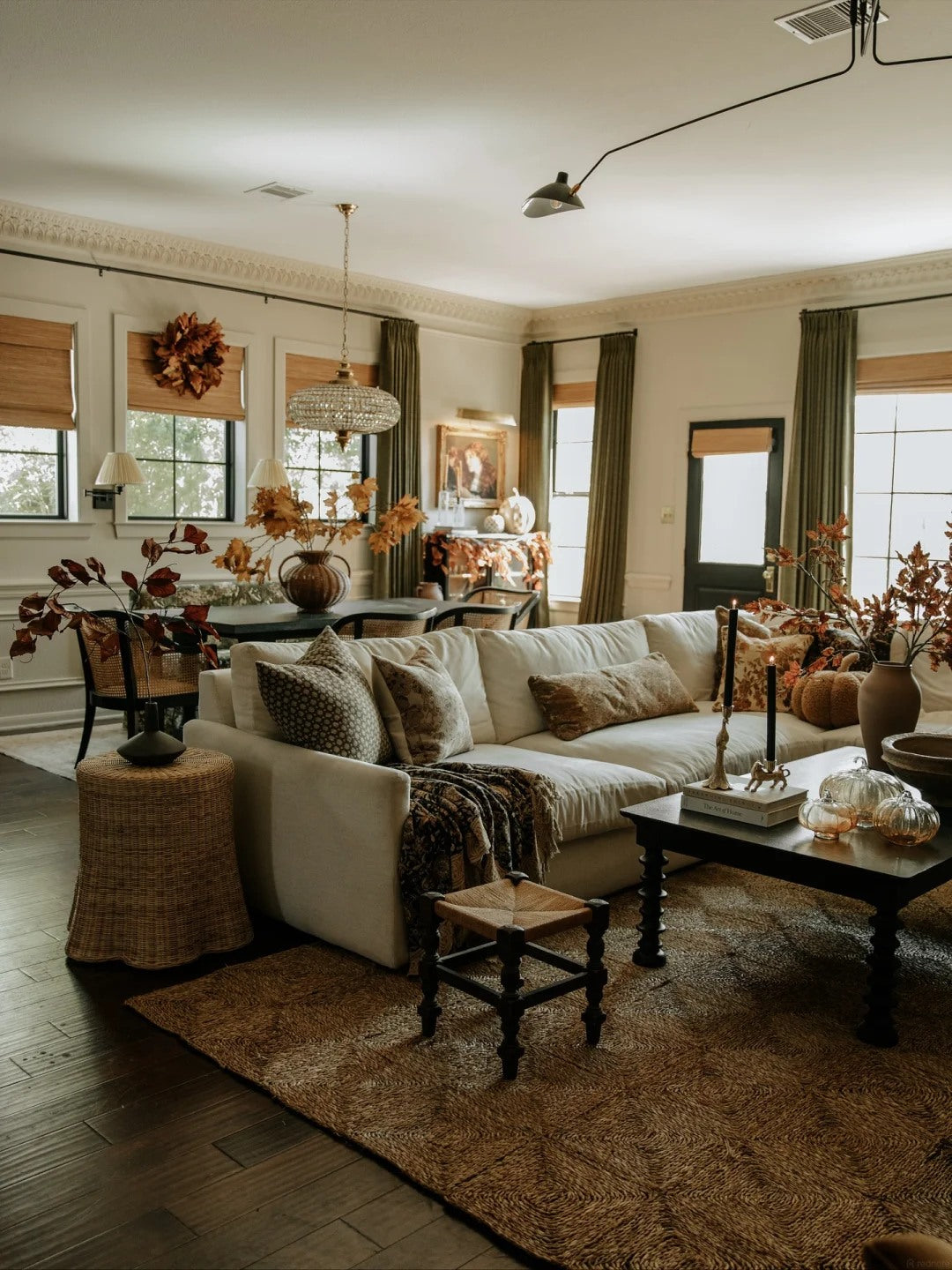 Rattan lighting adds warmth from above without making the room feel rustic.