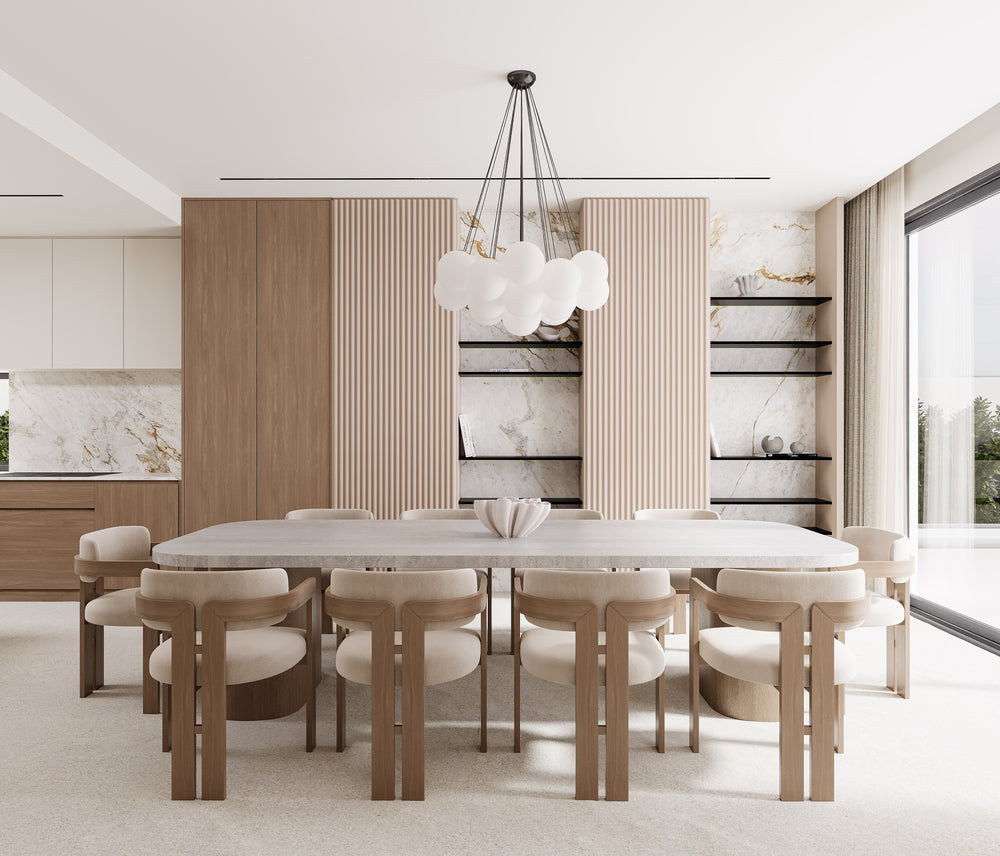 Modern dining room with a sculptural stone table and curved oak chairs
