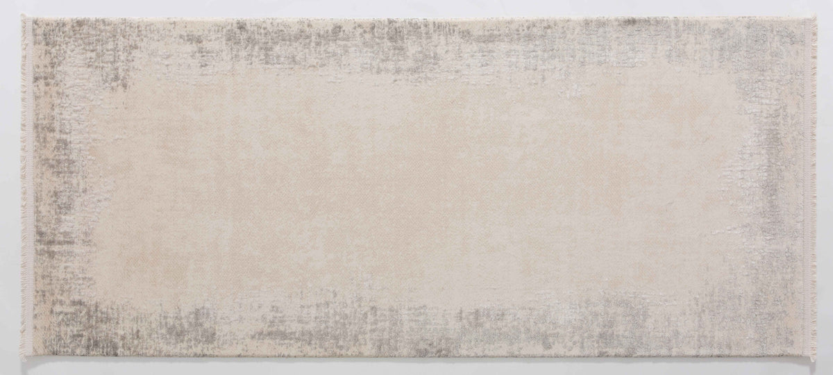 Taboo Isle Area Rug in a finished interior.