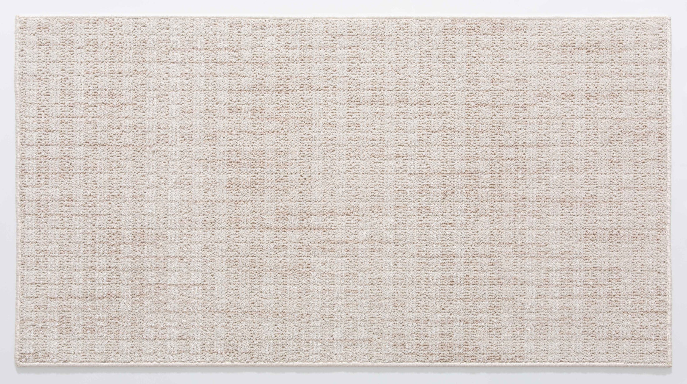 Silk Cotton Atlas Area Rug in a finished interior.