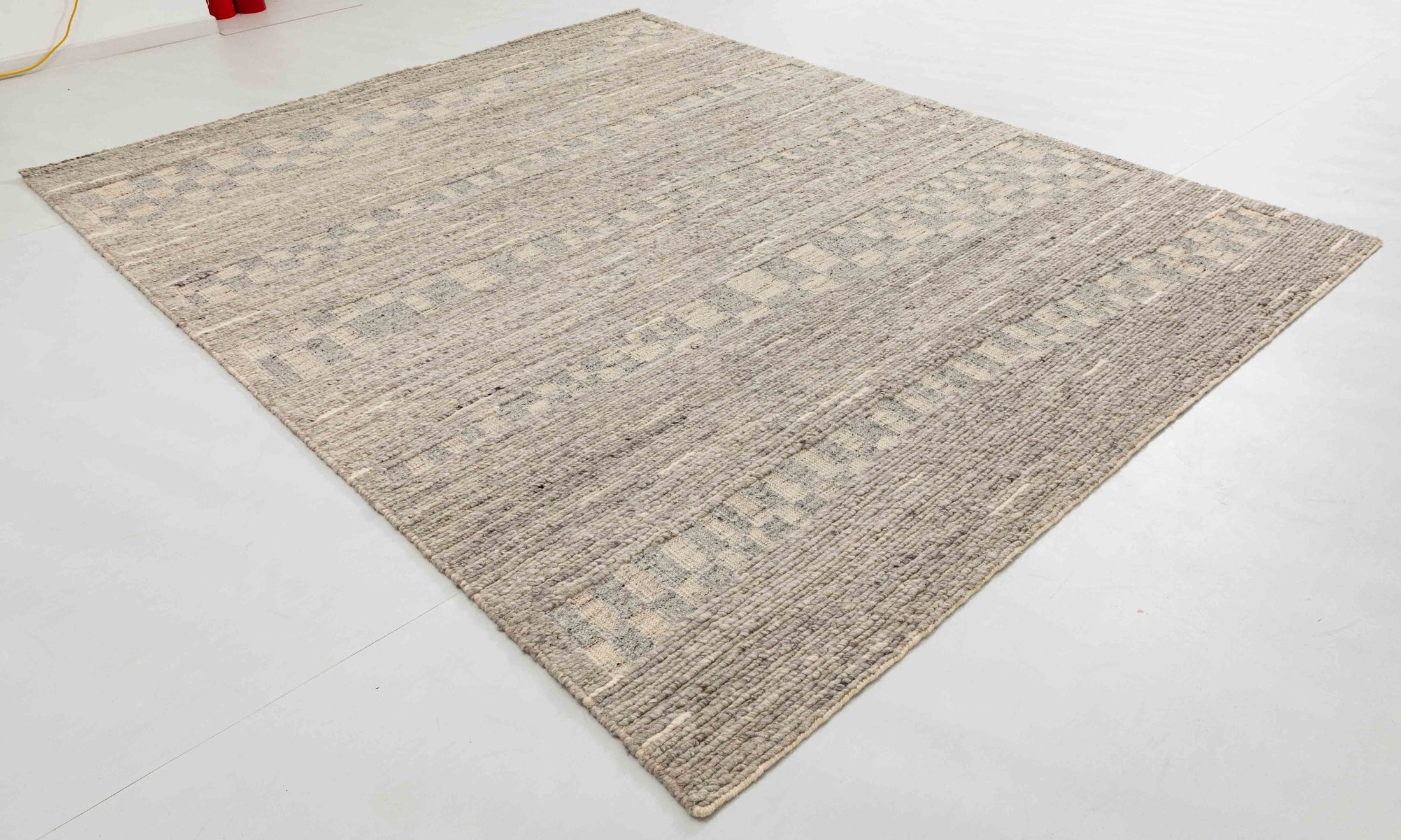 Mountain Bloom Area Rug in a finished interior.