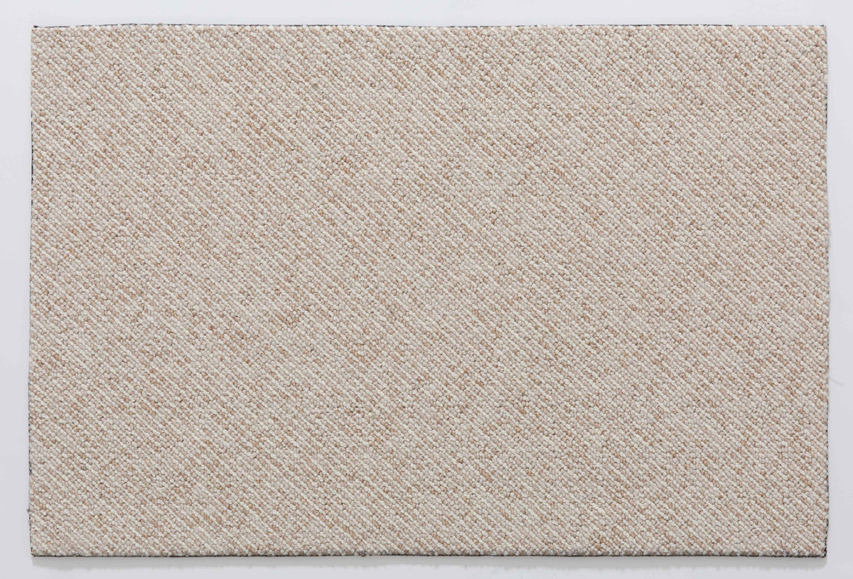 Frame Arc Area Rug in a finished interior.