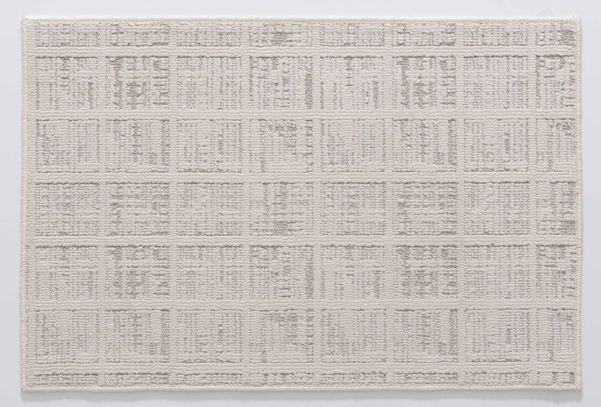 Shadow Bloom Area Rug in a finished interior.