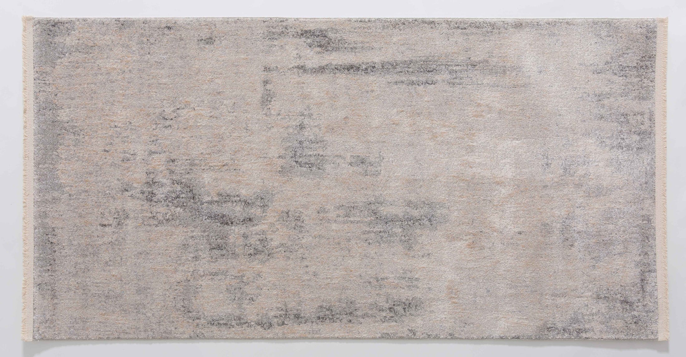 Infinitude Ember Area Rug in a finished interior.
