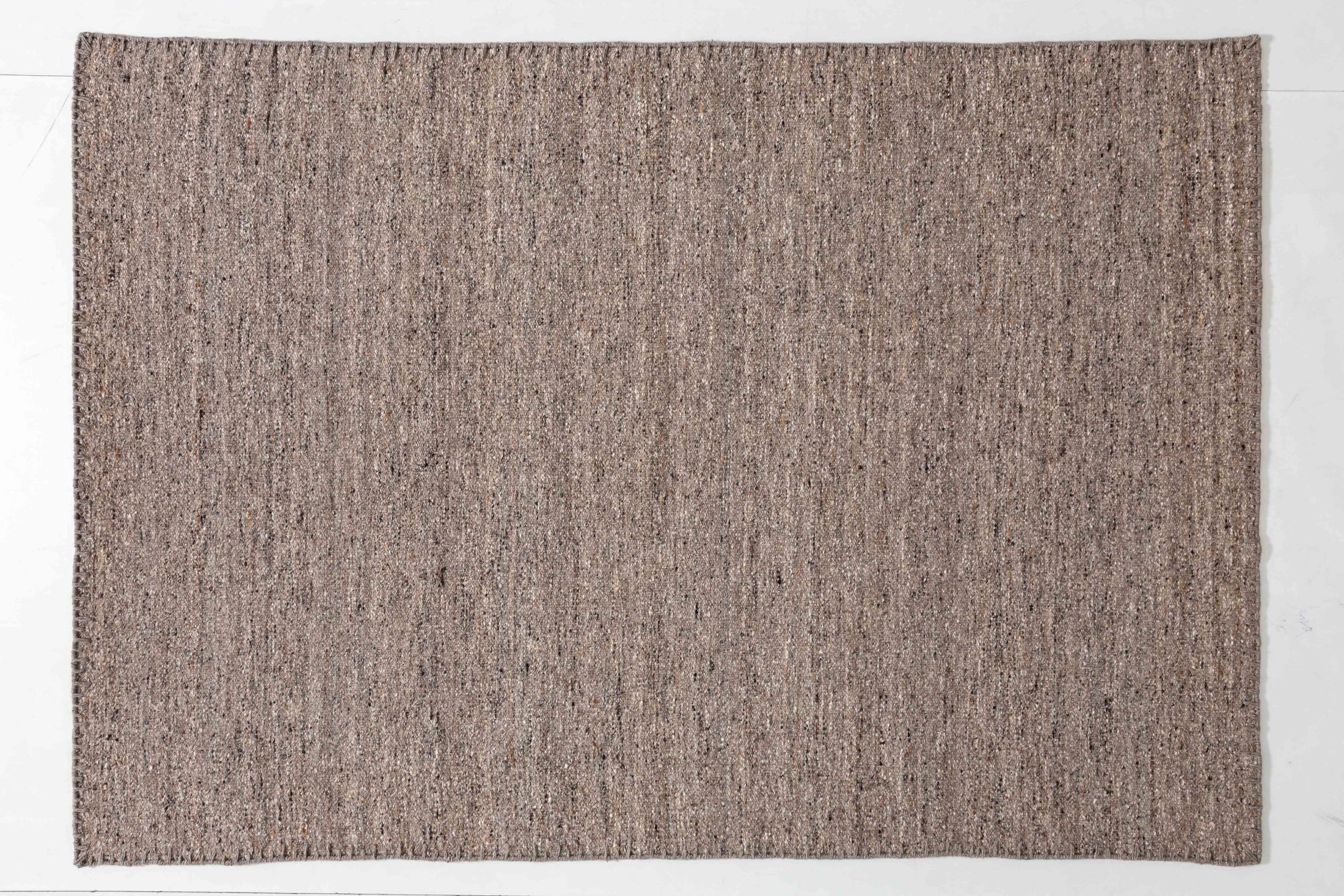 Film Arc Area Rug in a finished interior.