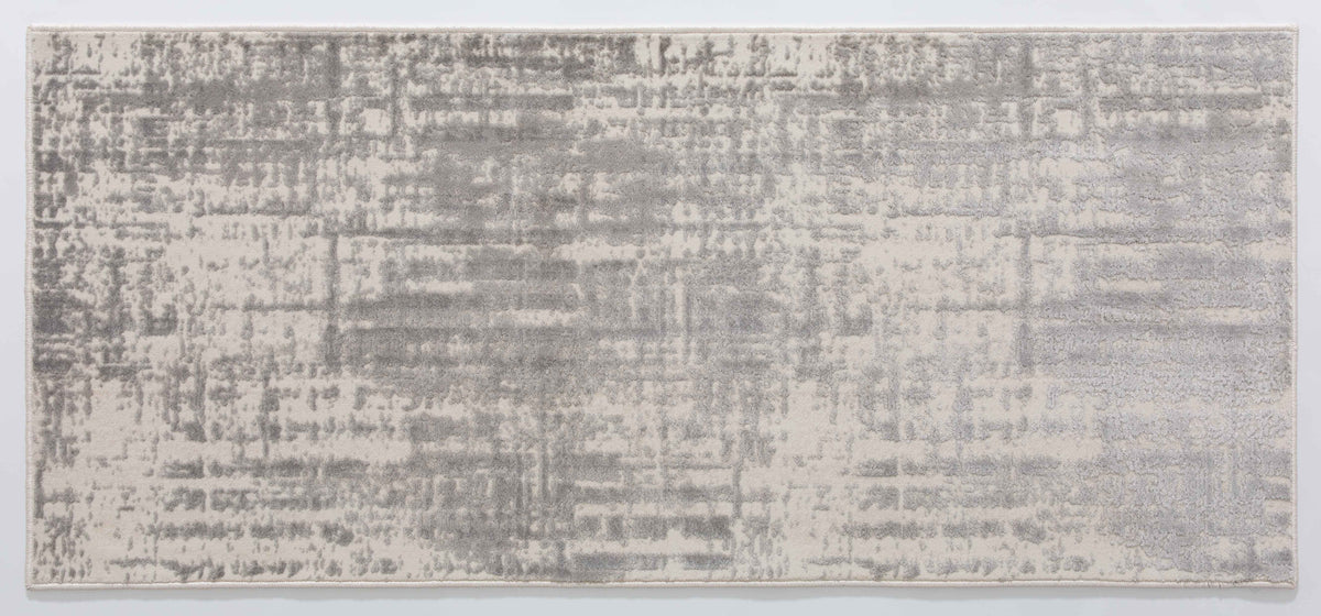 Taboo Halo Area Rug in a finished interior.