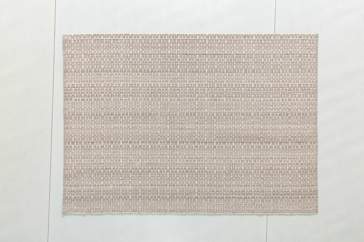 Oak Atlas Area Rug in a finished interior.