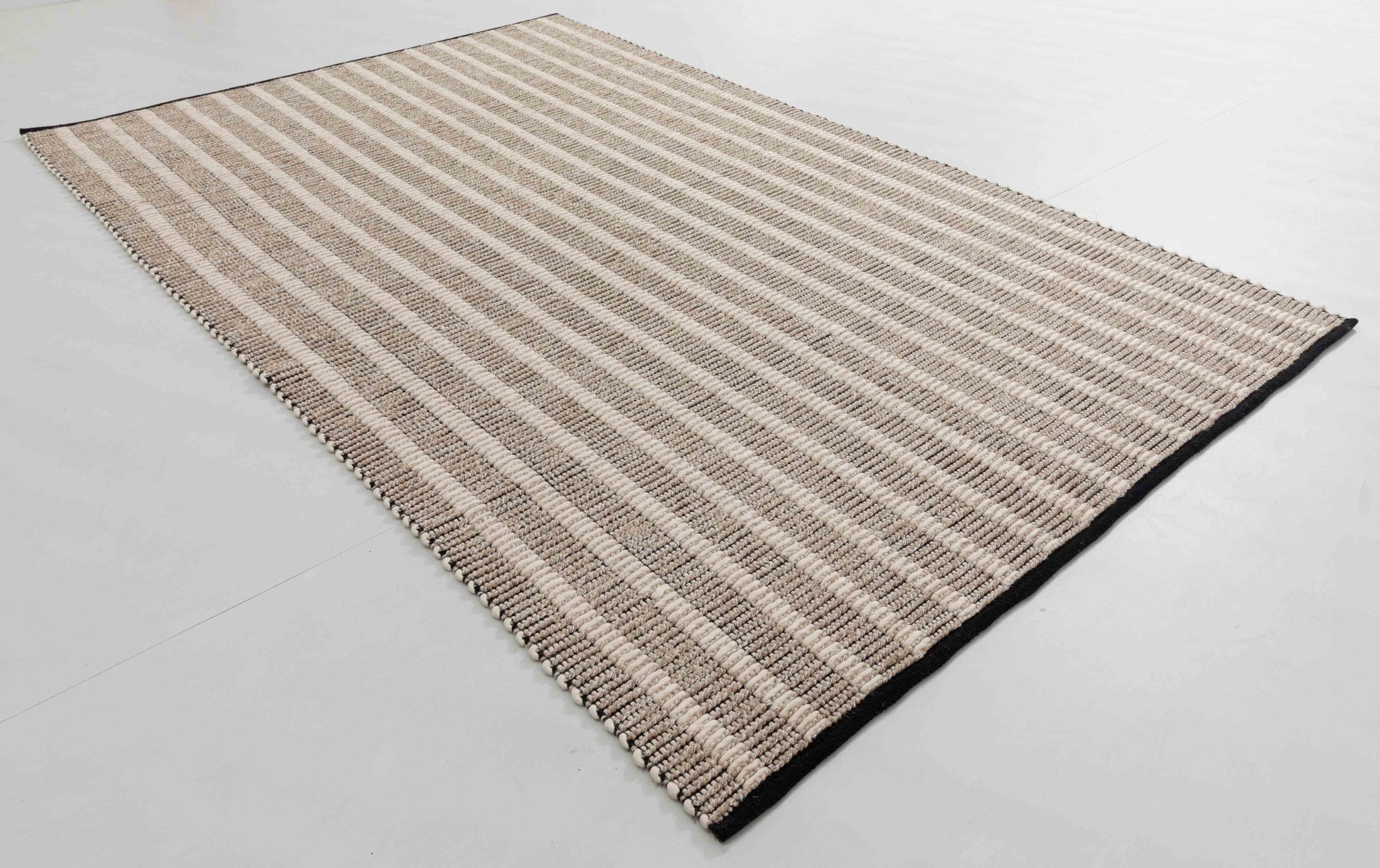 Harta Bloom Area Rug in a finished interior.
