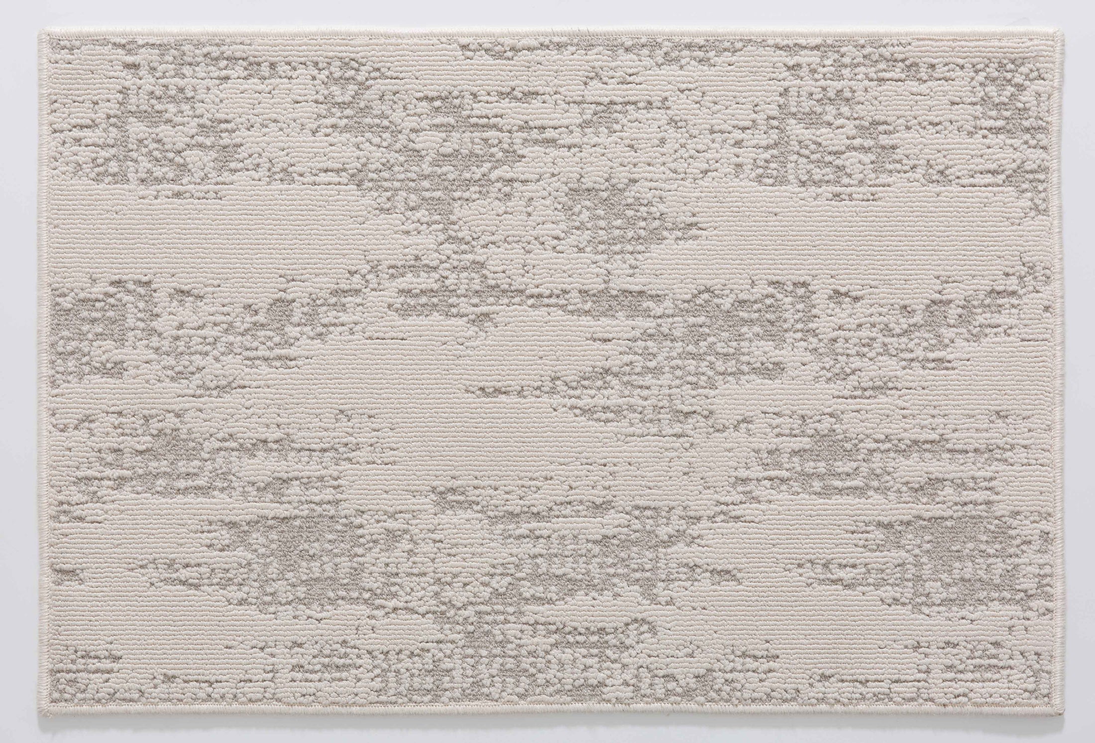 Shadow Arbor Area Rug in a finished interior.