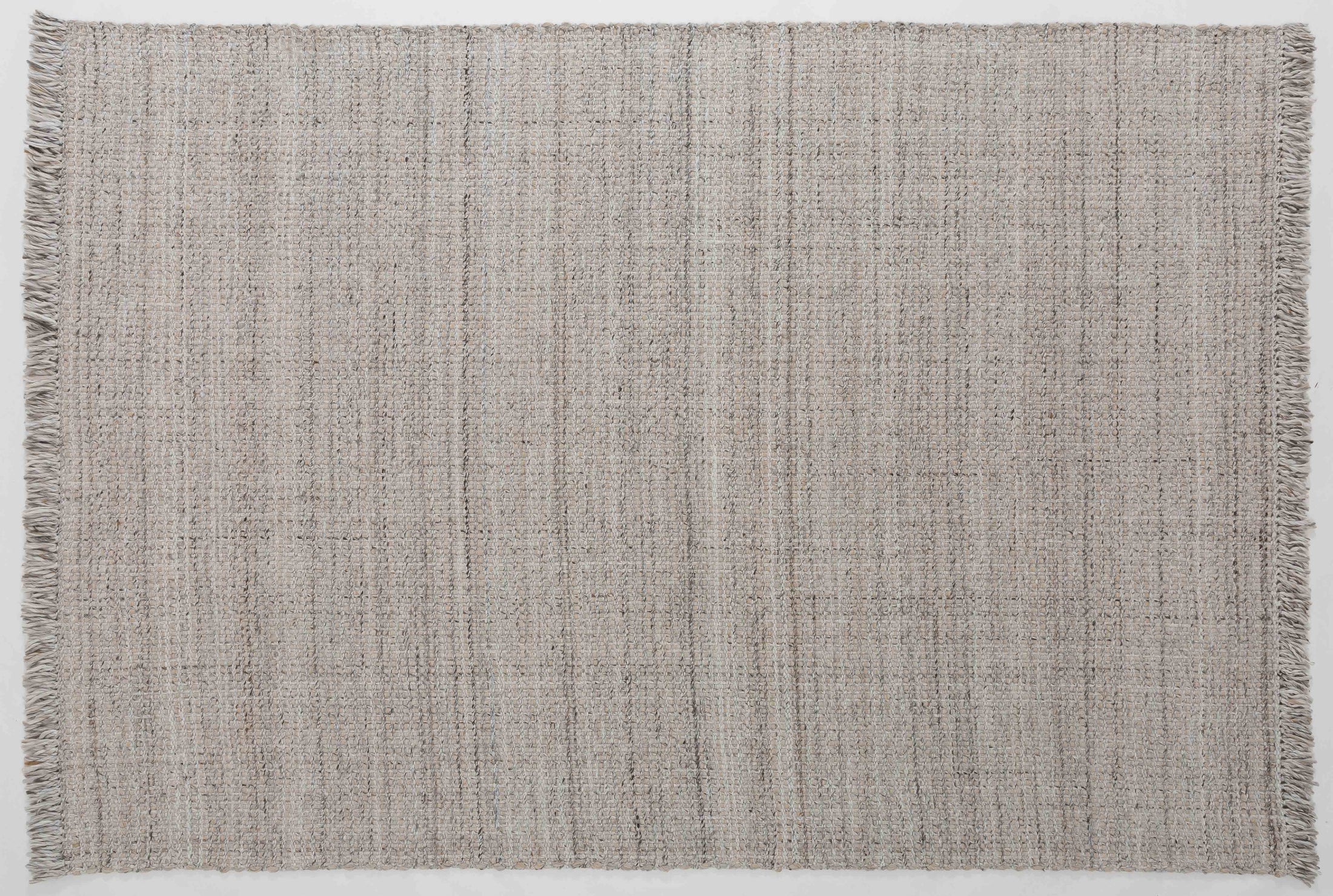 Cascade Cairn Area Rug in a finished interior.