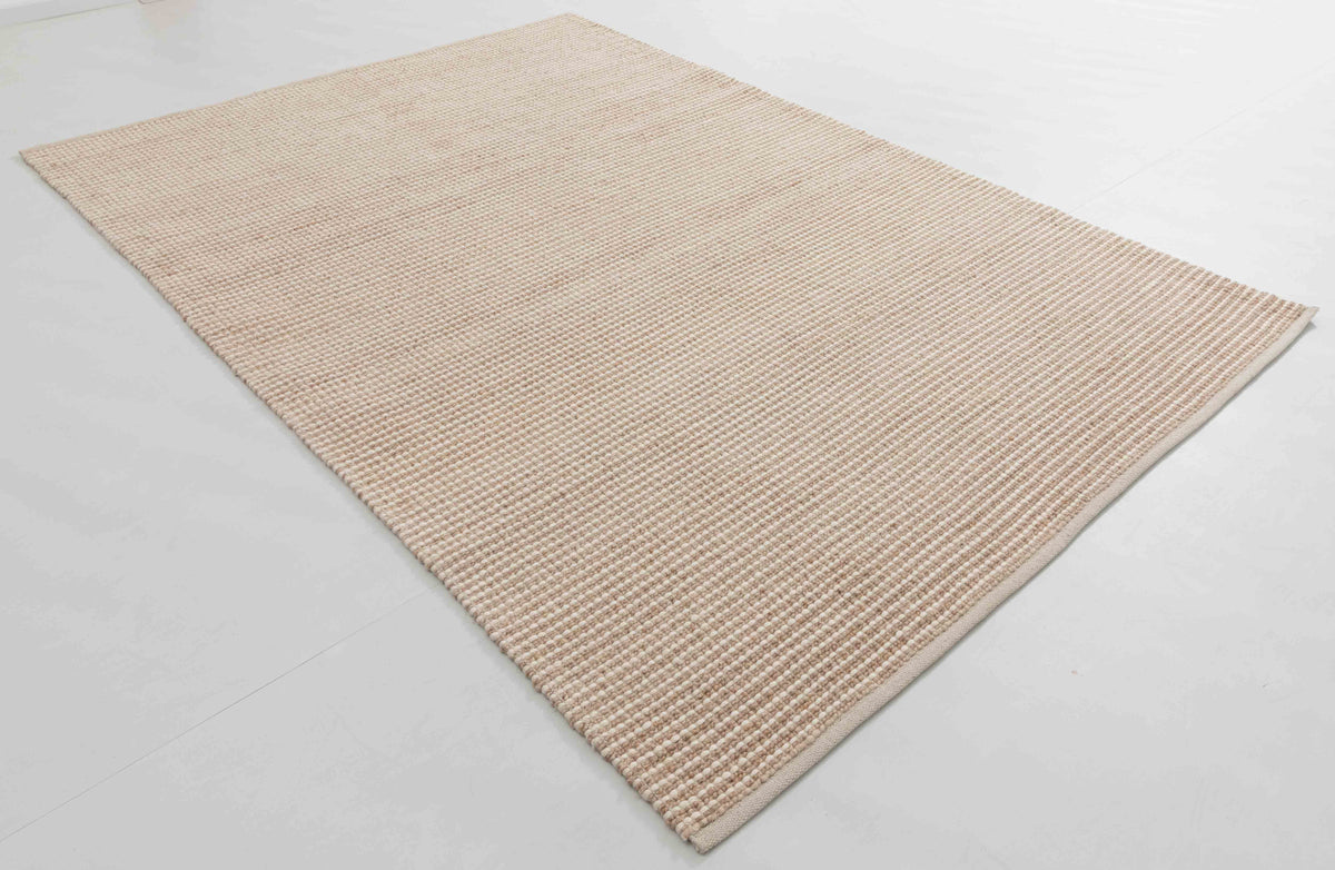 Spin Arc Area Rug in a finished interior.