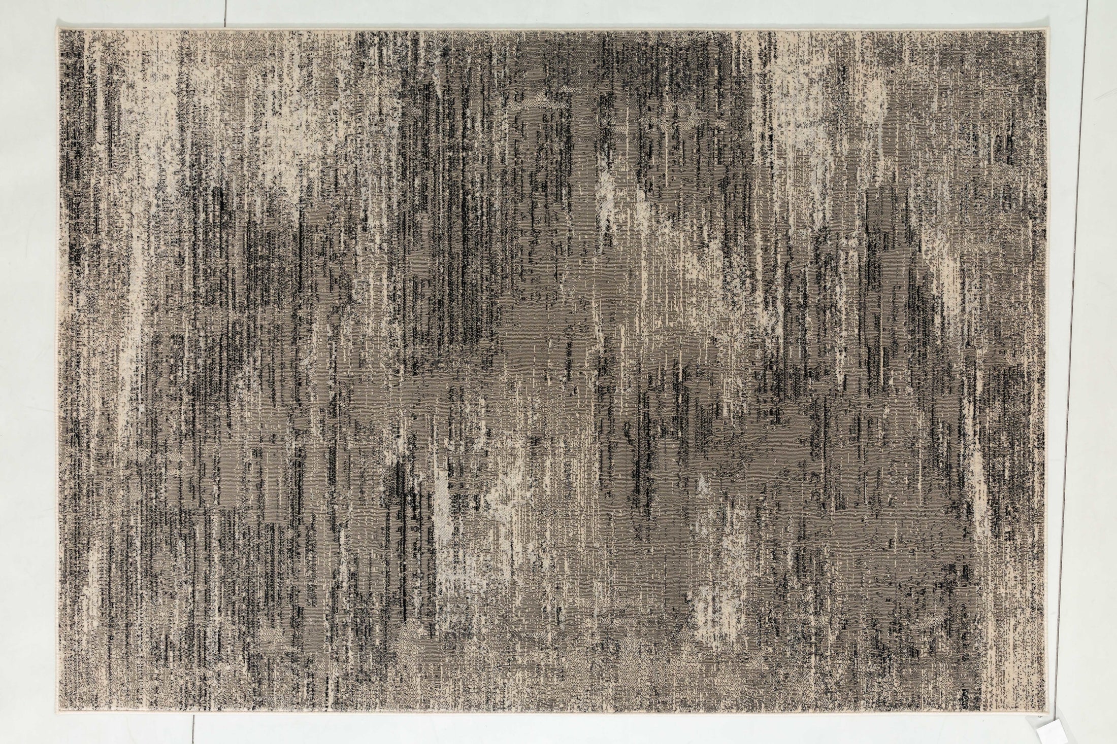 Raw Bloom Area Rug in a finished interior.