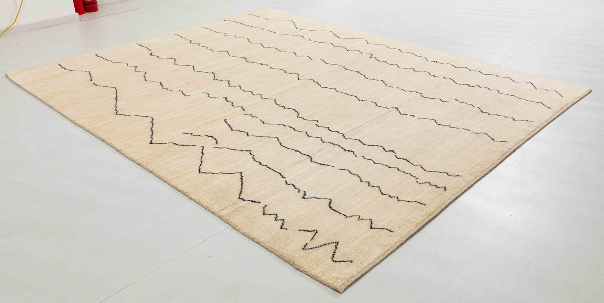Stone Bloom Area Rug in a finished interior.