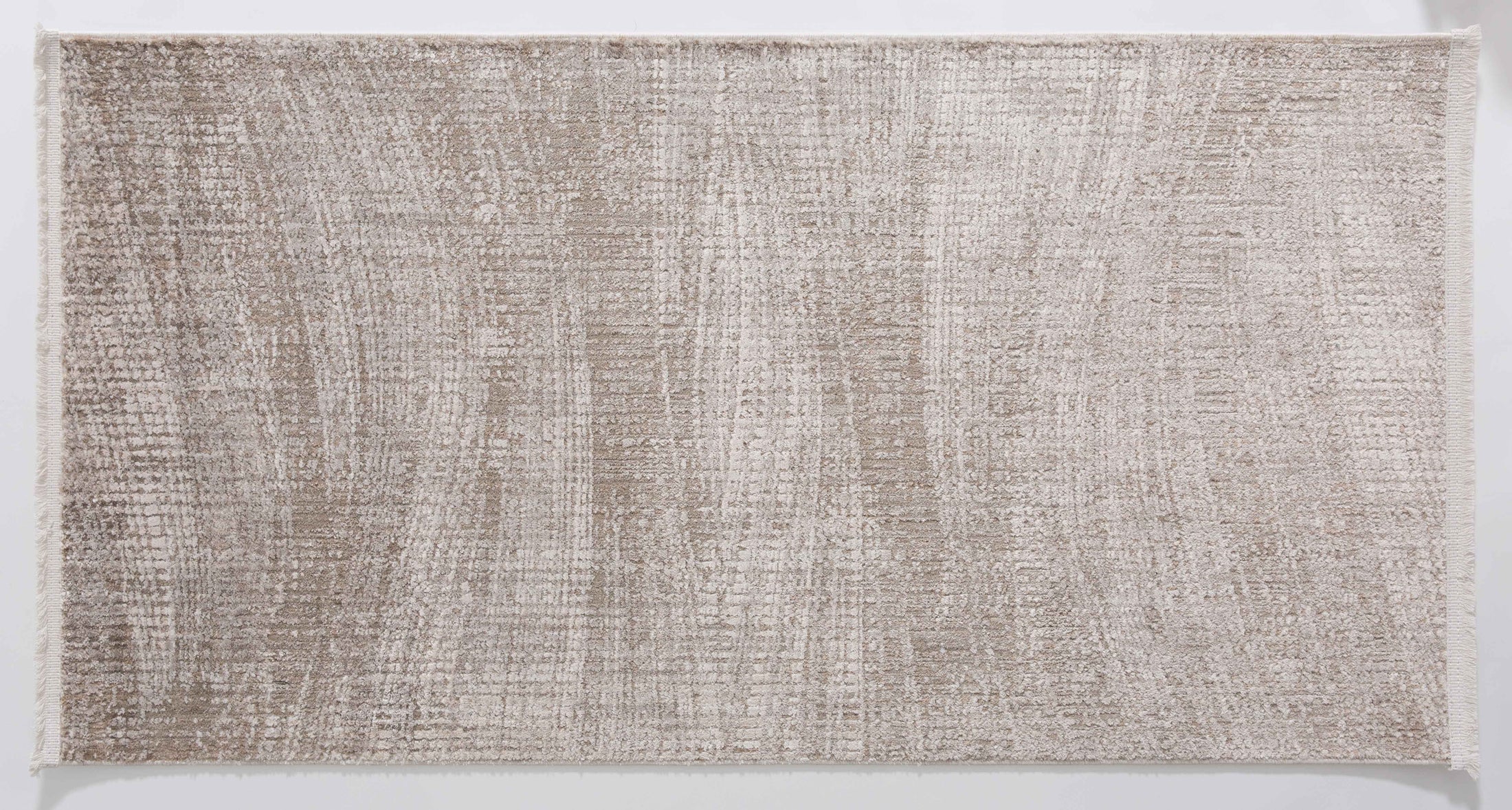 Halo Dawn Area Rug in a finished interior.