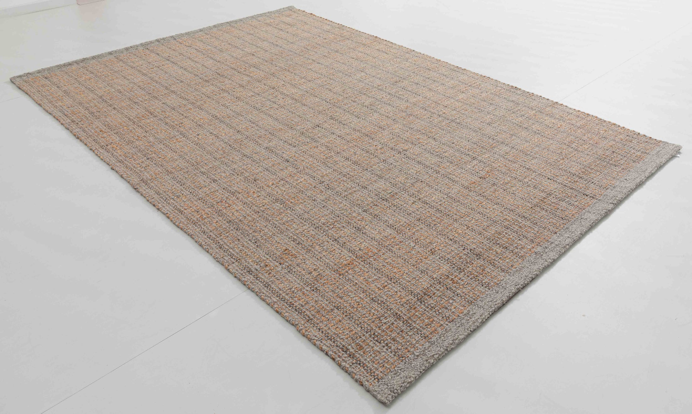 Courtyard Arc Area Rug in a finished interior.