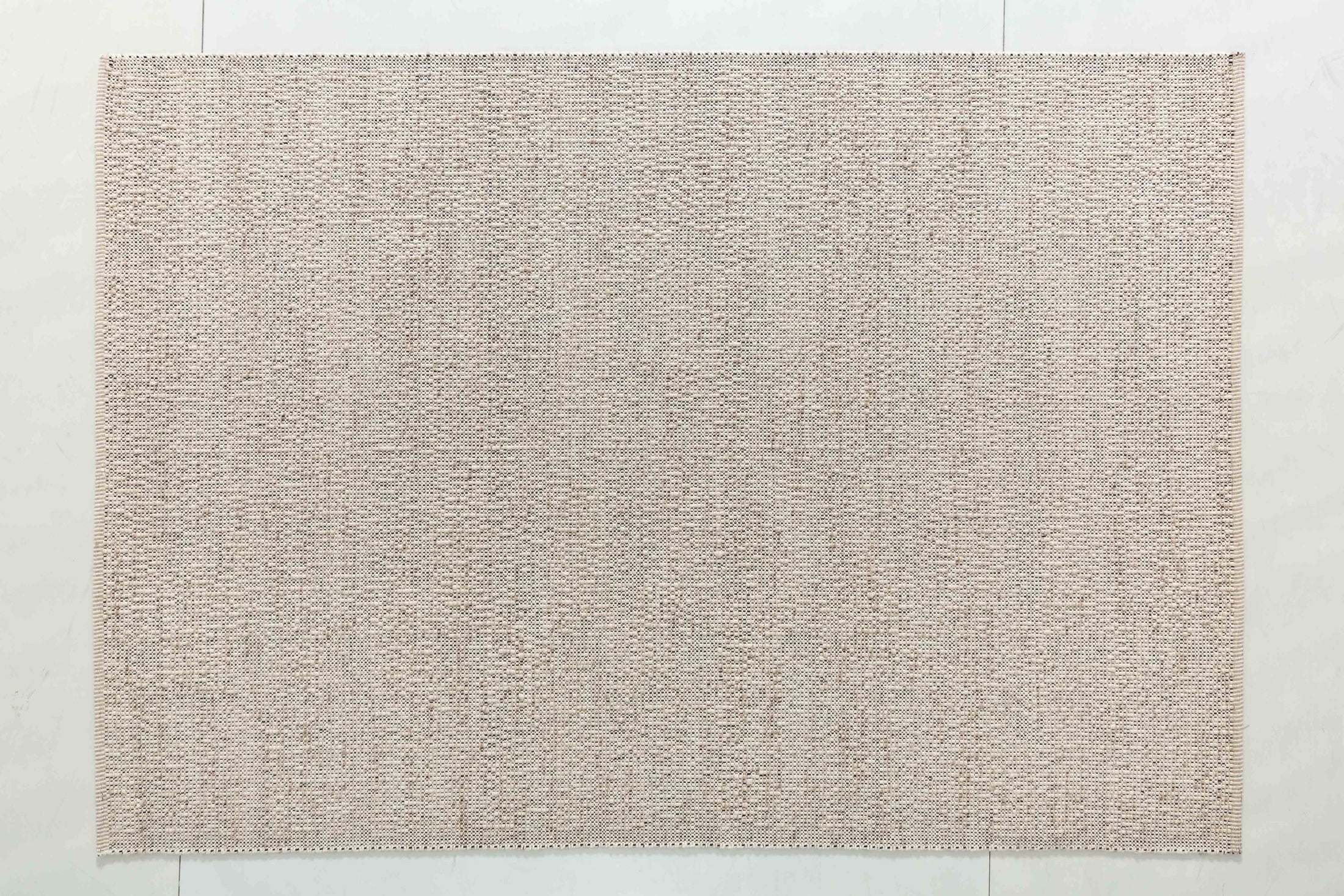 Bubble Arc Area Rug in a finished interior.