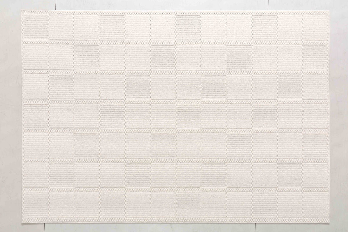 Wheat Cove Area Rug in a finished interior.