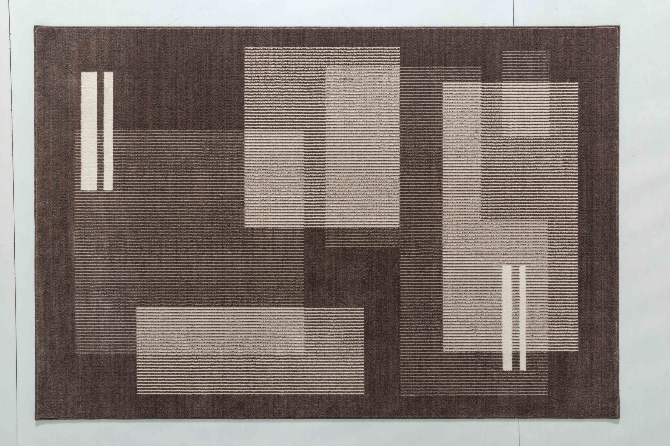 Natural Cove Area Rug in a finished interior.