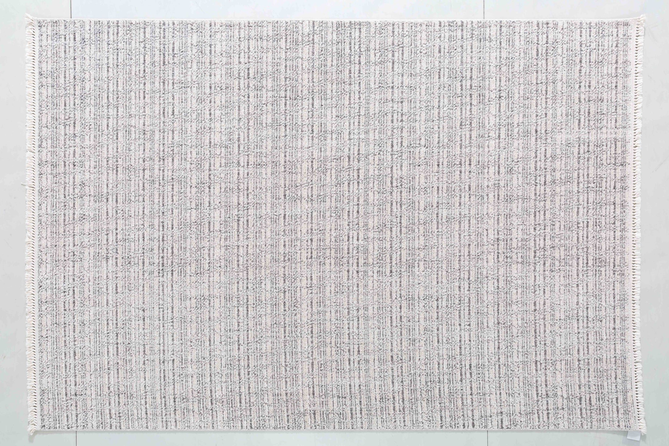 Silk Cotton Bloom Area Rug in a finished interior.