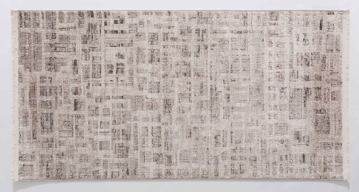 Halo Cairn Area Rug in a finished interior.