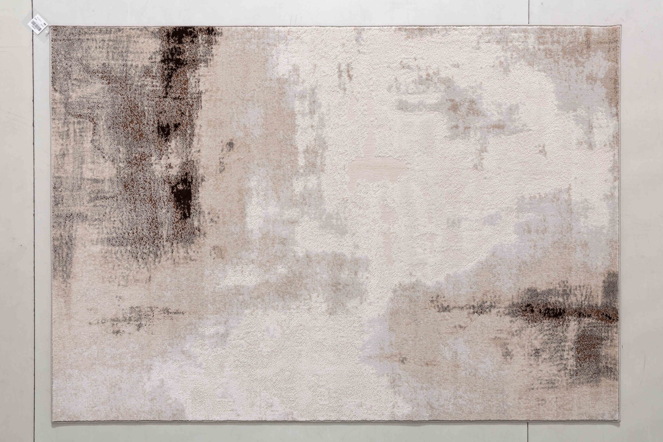 Locke Cairn Area Rug in a finished interior.