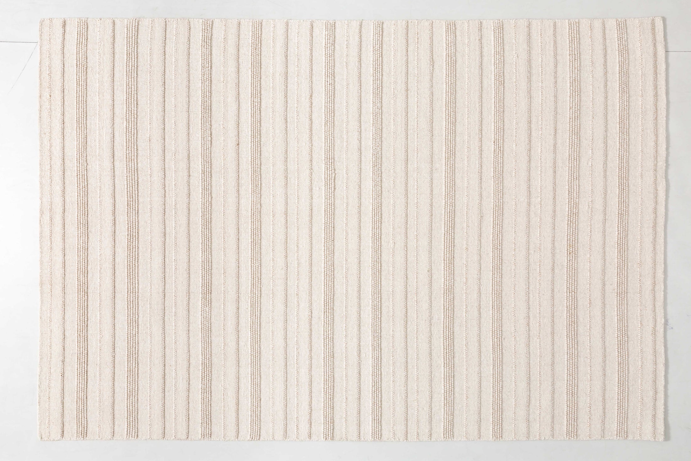 Element Arc Area Rug in a finished interior.