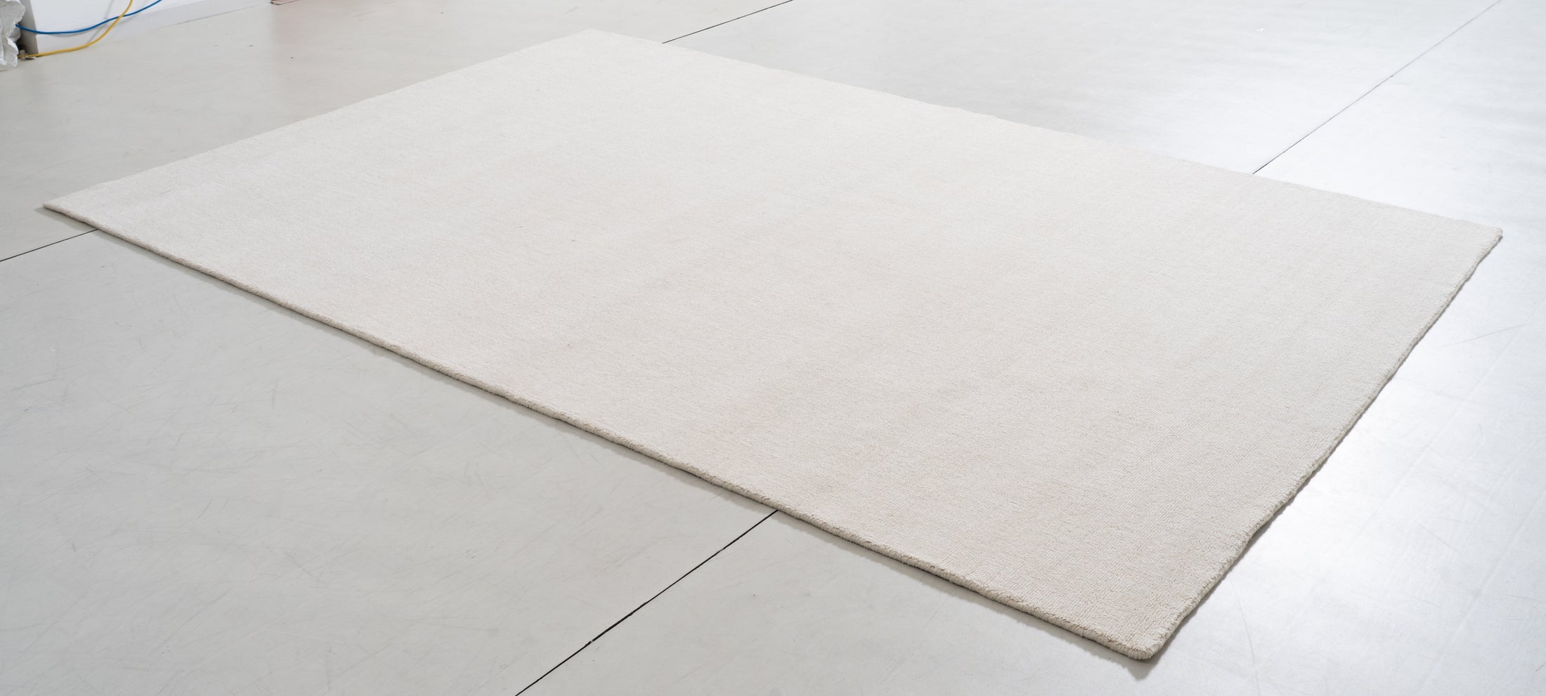 Silhouette Cove Area Rug in a finished interior.