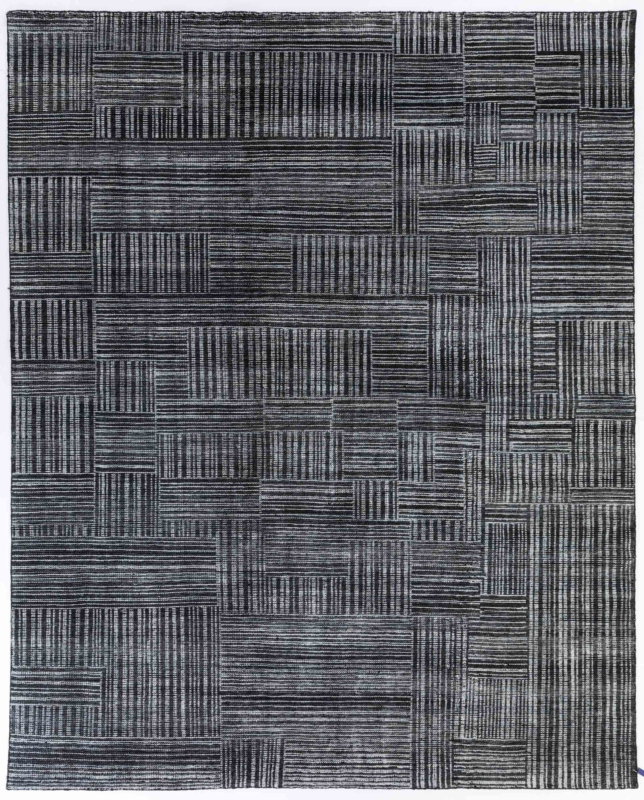 Panamera Arc Area Rug in a finished interior.