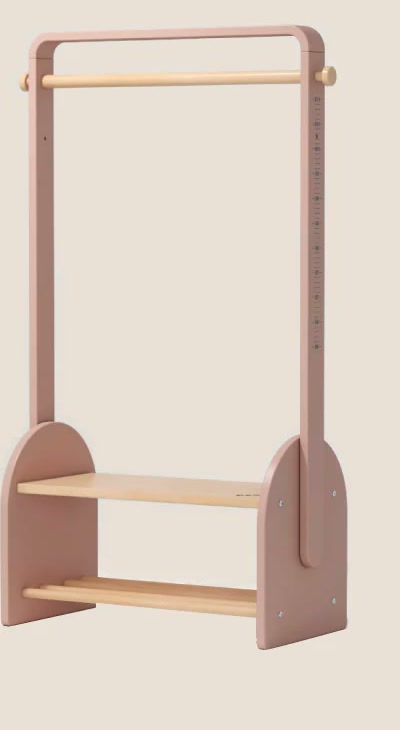  Cherry Pink clothing rack with height scale and lower storage base