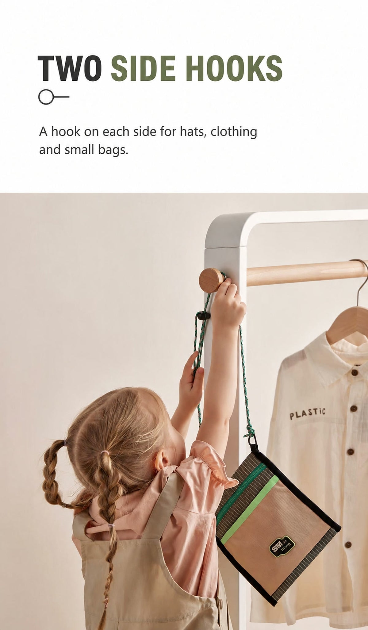  Side hook holding a small bag beside the hanging rail