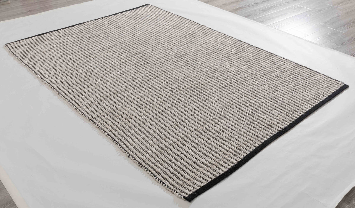 Inside Arc Area Rug in a finished interior.