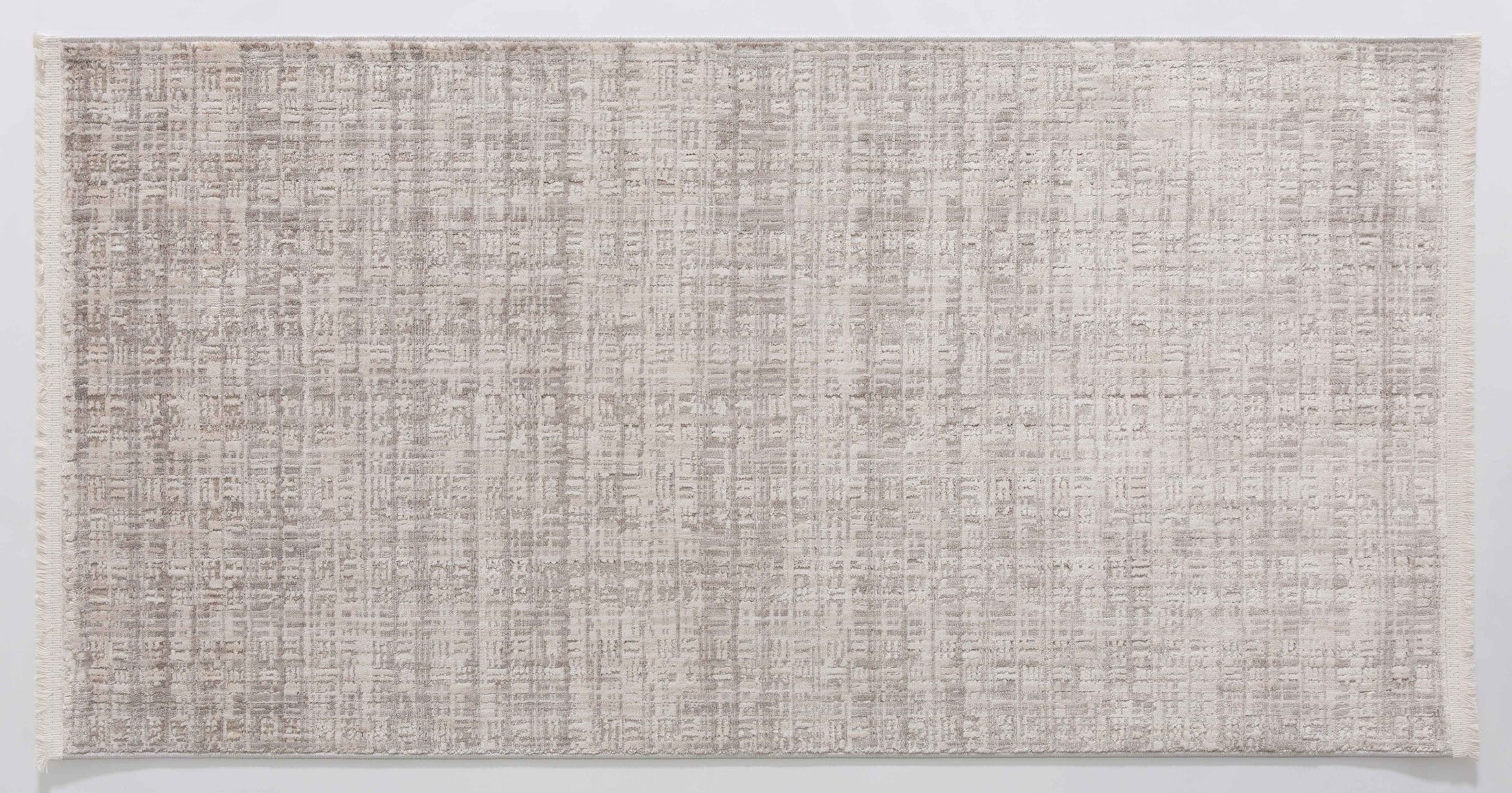 Halo Atlas Area Rug in a finished interior.