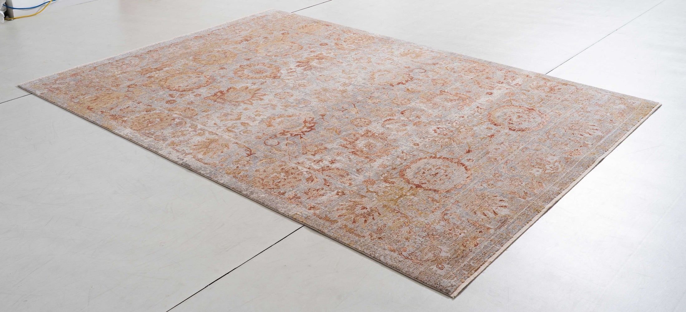 Legend Cairn Area Rug in a finished interior.