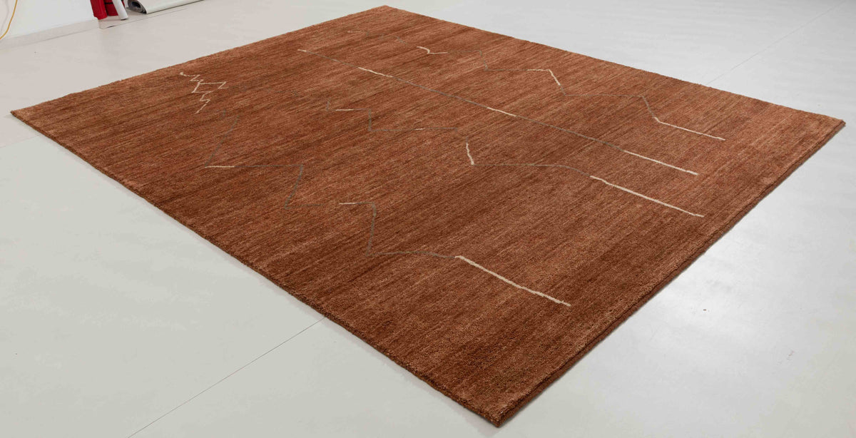Stone Atlas Area Rug in a finished interior.