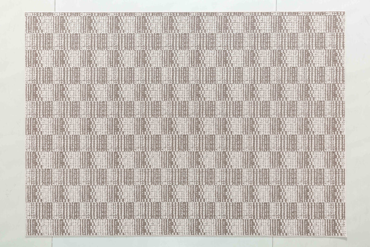 Sands Bloom Area Rug in a finished interior.