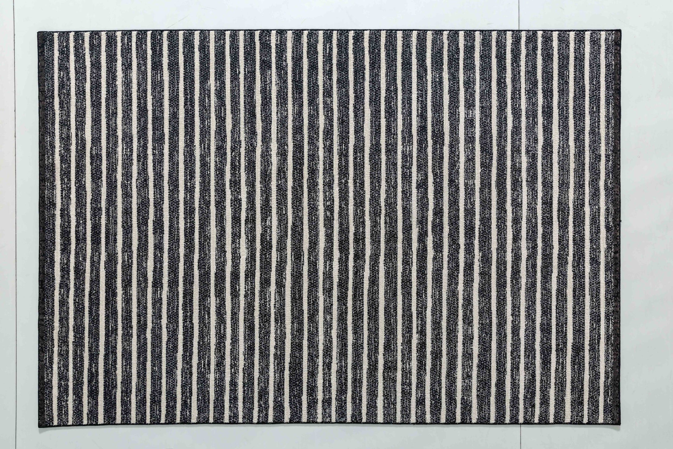 Natural Bloom Area Rug in a finished interior.