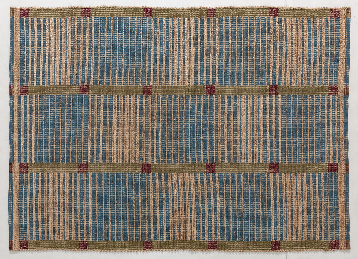 Huegem Bloom Area Rug in a finished interior.