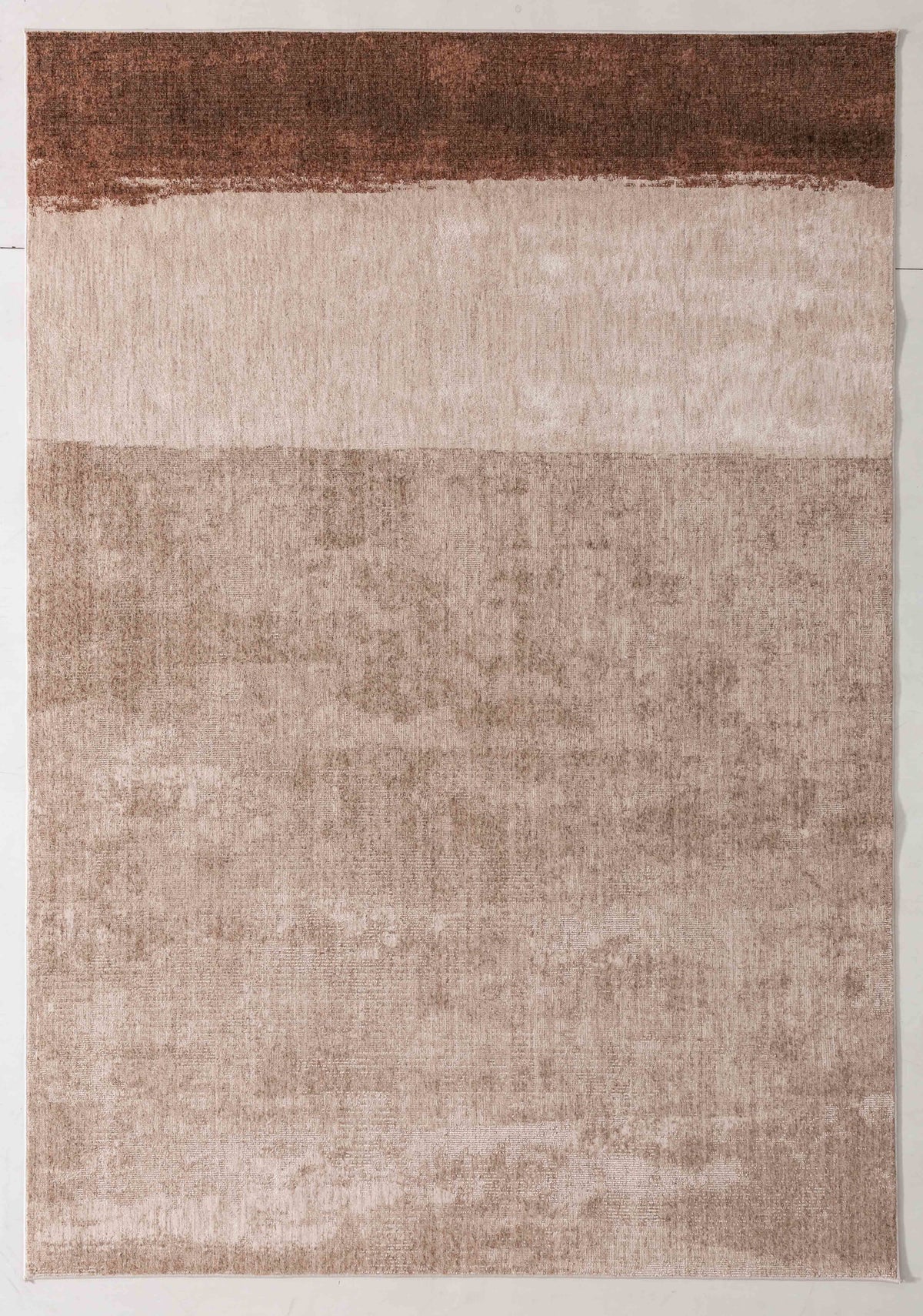Painter Glade Area Rug in a finished interior.