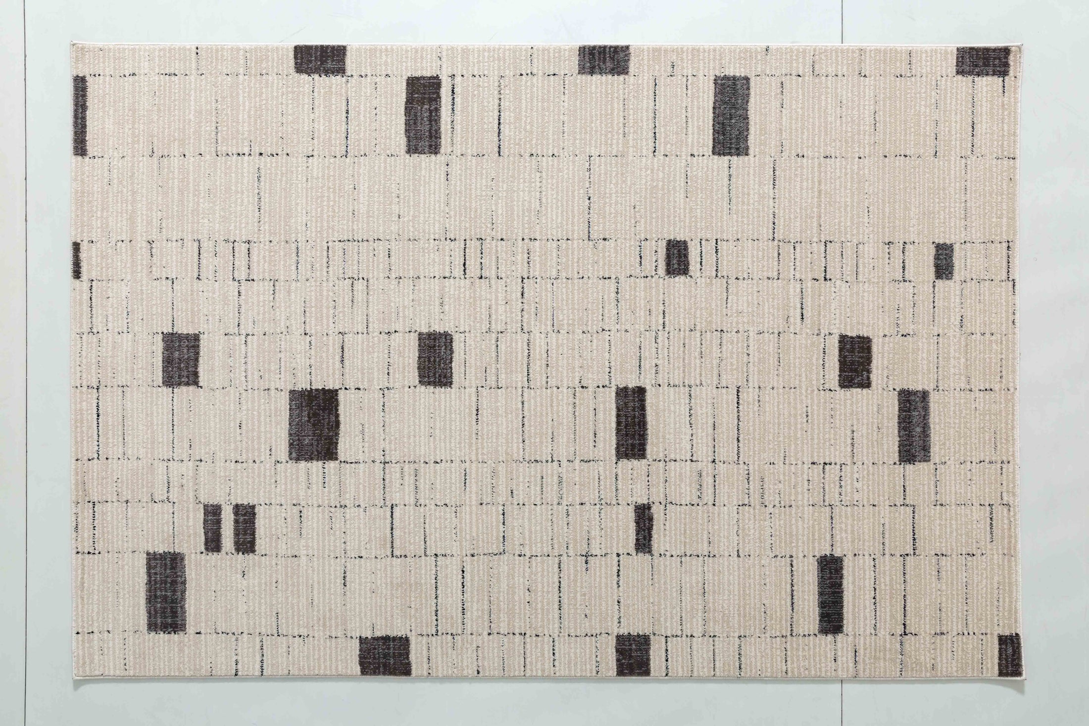 Natural Arc Area Rug in a finished interior.