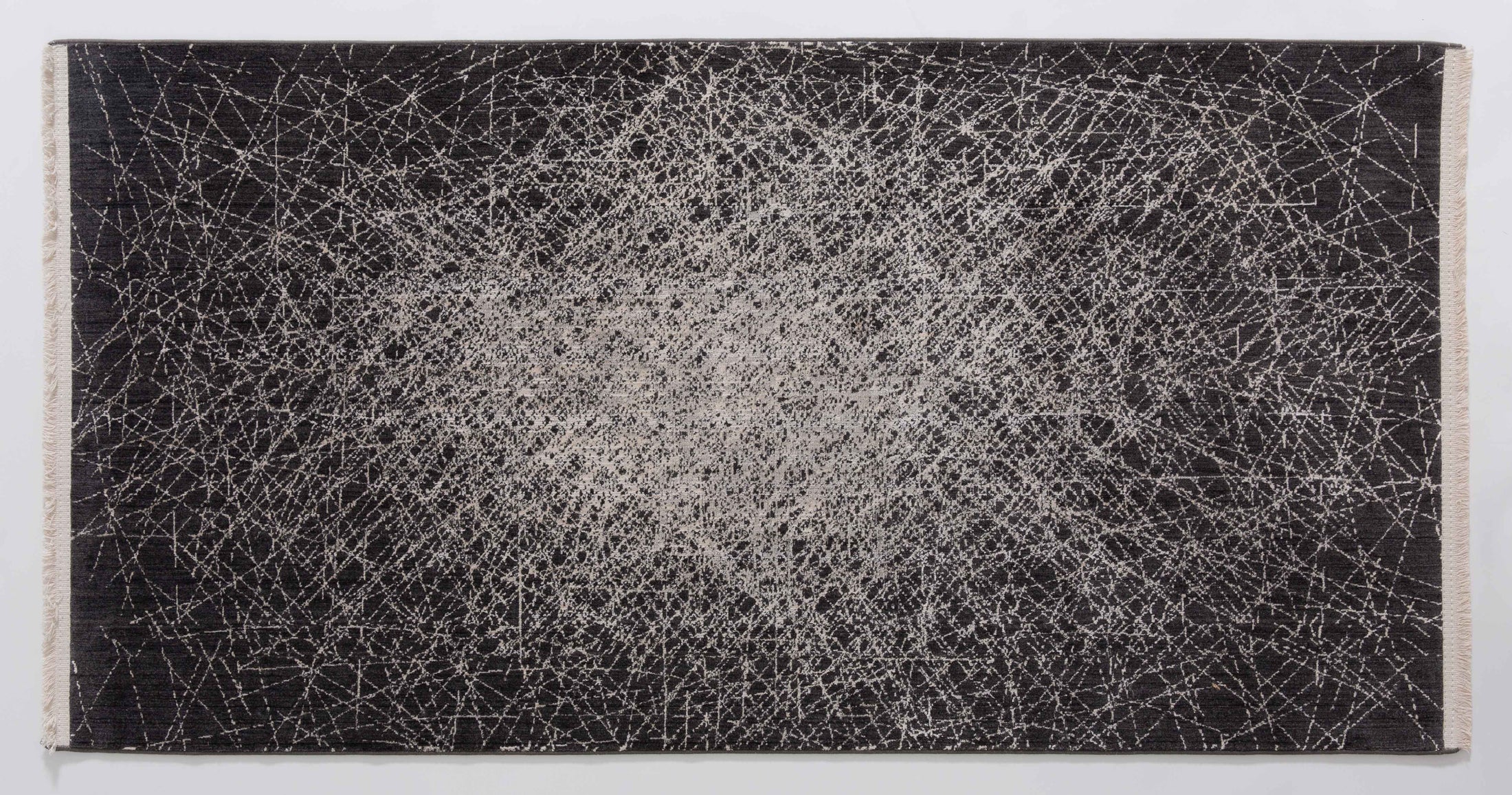 Master Arc Area Rug in a finished interior.