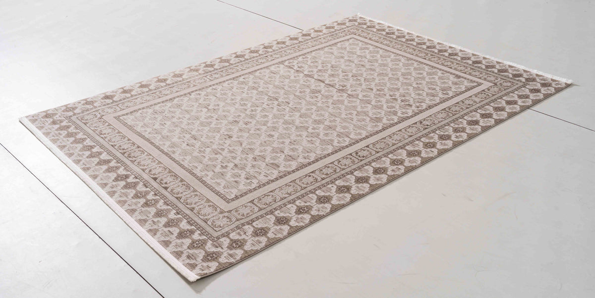 Delicate Dune Area Rug in a finished interior.