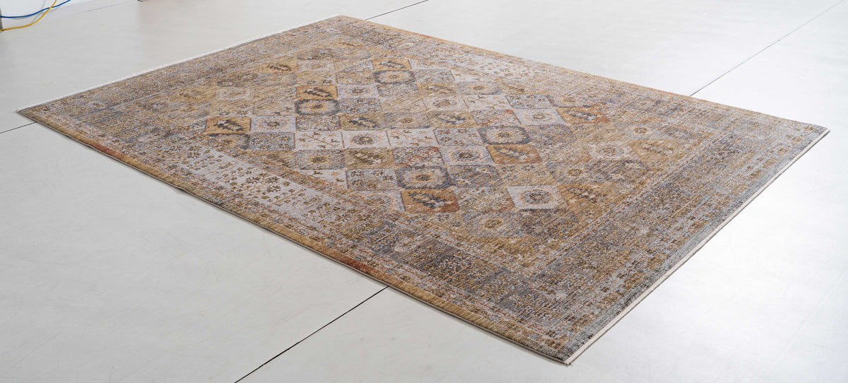 Legend Bloom Area Rug in a finished interior.
