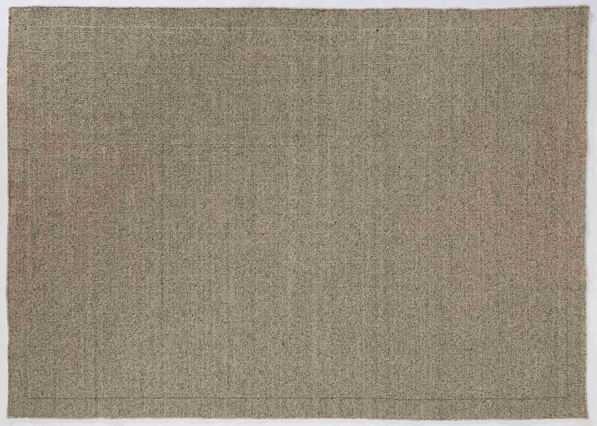 Easy Cairn Area Rug in a finished interior.