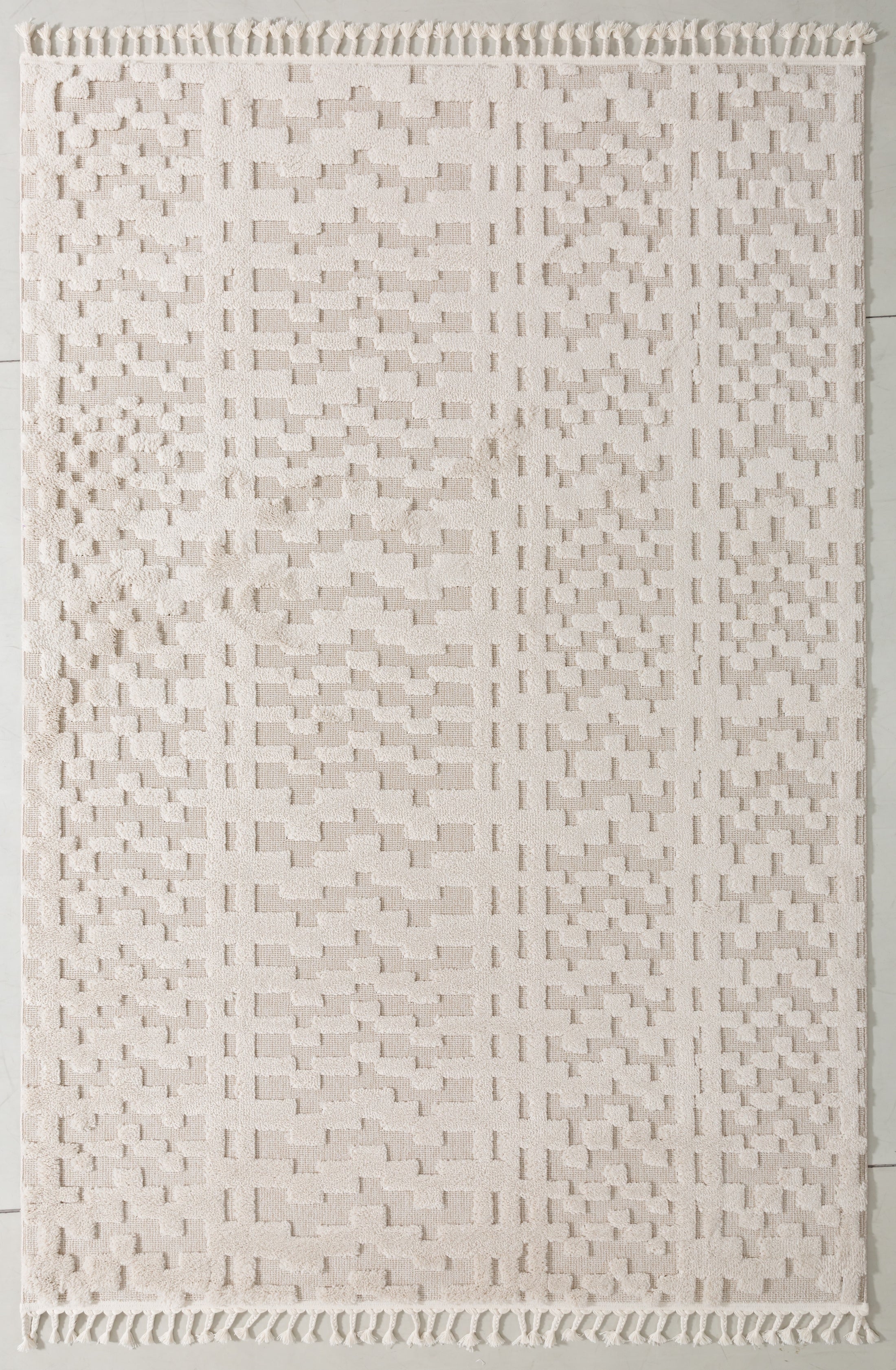 Puff Arc Area Rug in a finished interior.