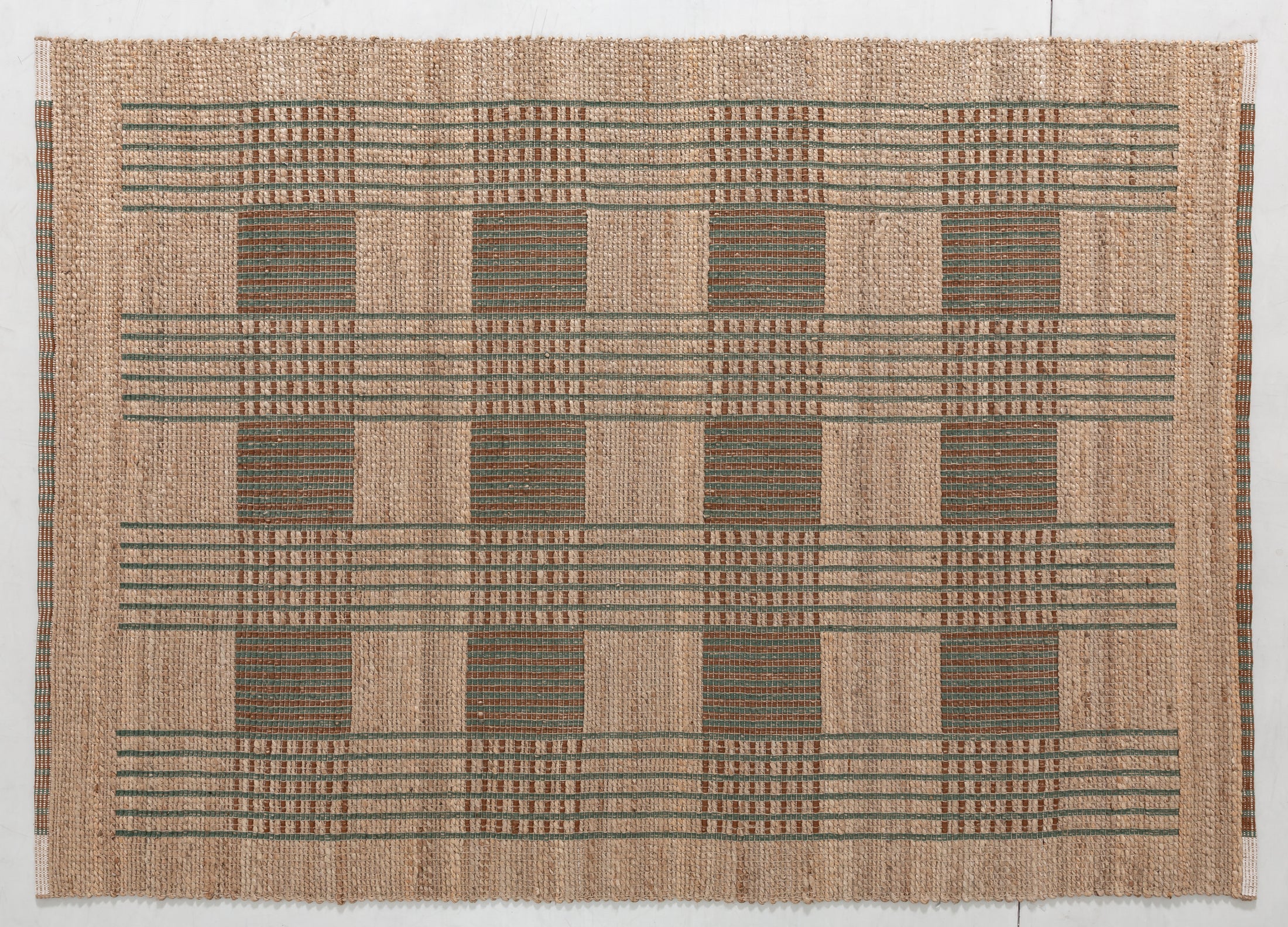 Huegem Atlas Area Rug in a finished interior.