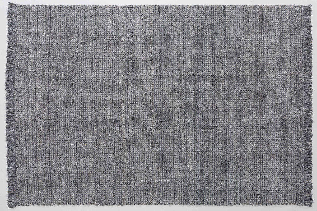 Cascade Arc Area Rug in a finished interior.