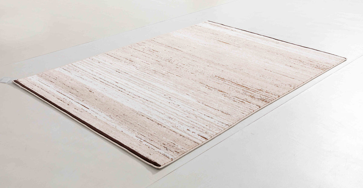 Locke Arc Area Rug in a finished interior.