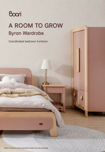  Side view of Cherry Byron wardrobe in a coordinated bedroom; other furniture not included